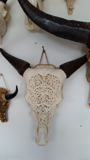 skull carving statue