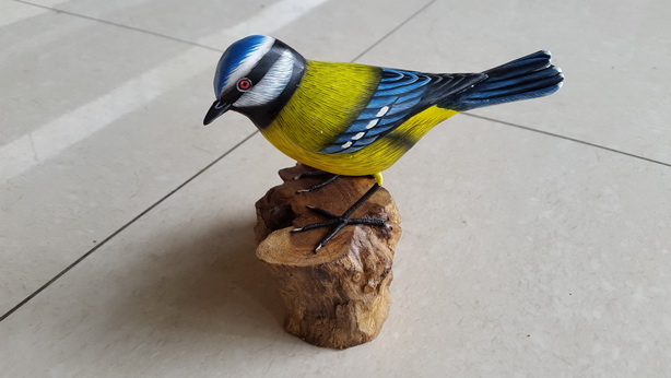 bird on wood statue